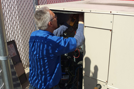 Our Commercial HVAC repair team troubleshoots a commercial unit to quickly diagnose and repair the problem.