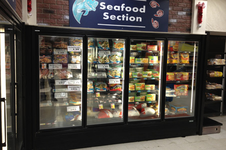 Lindsey Refrigeration installed this refrigerated glass door merchandising unit along with several multi deck grocery display units.